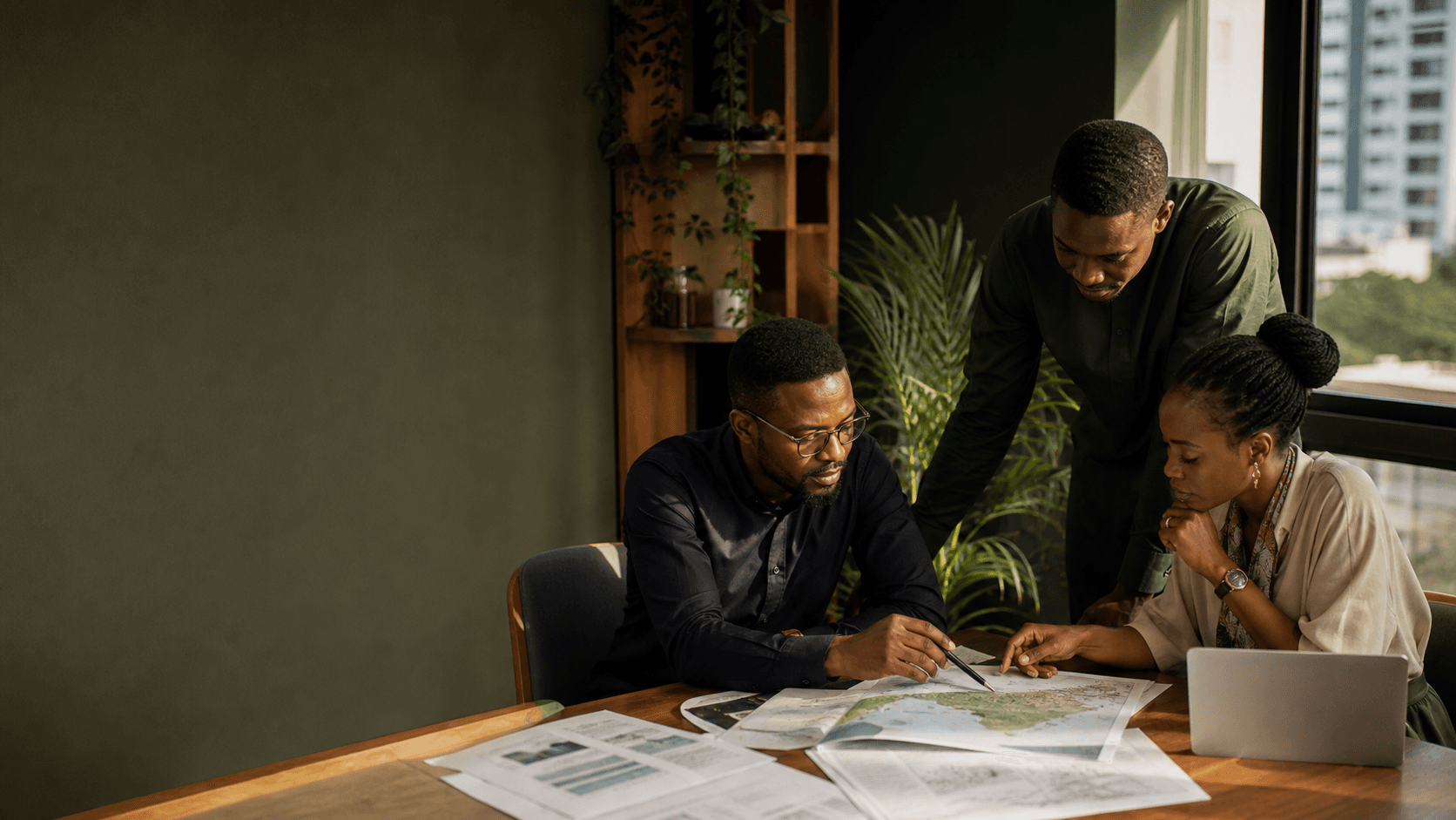 Nigerian professionals reviewing labour-market research together